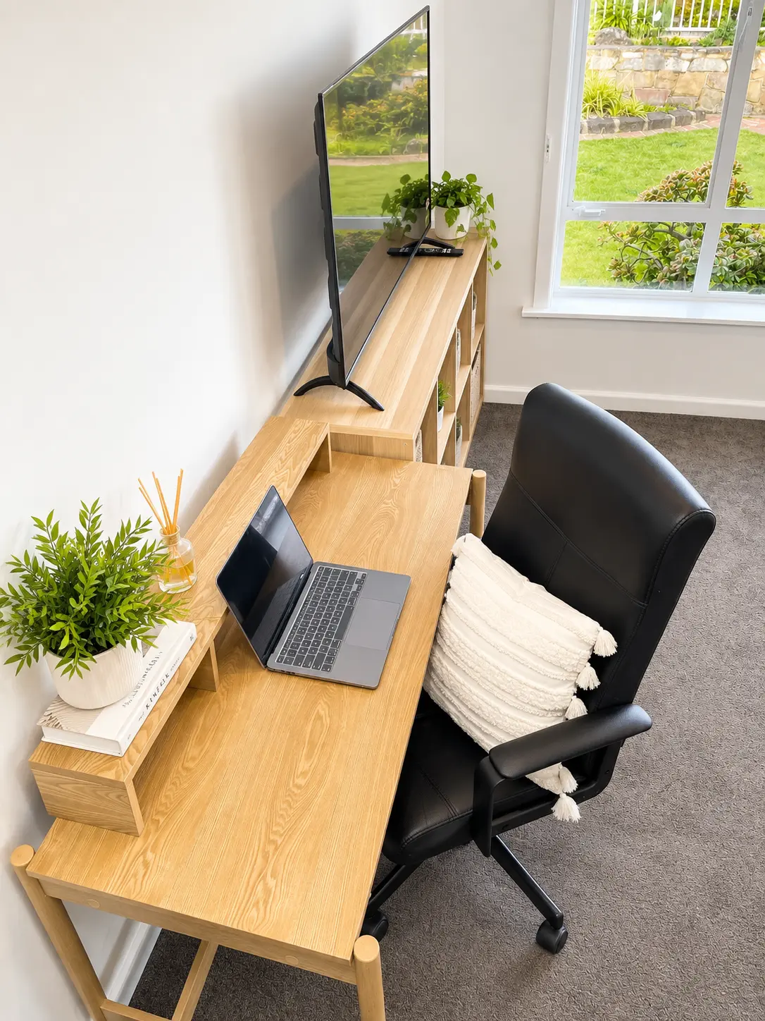 Hampton East Room 1 — workspace and television